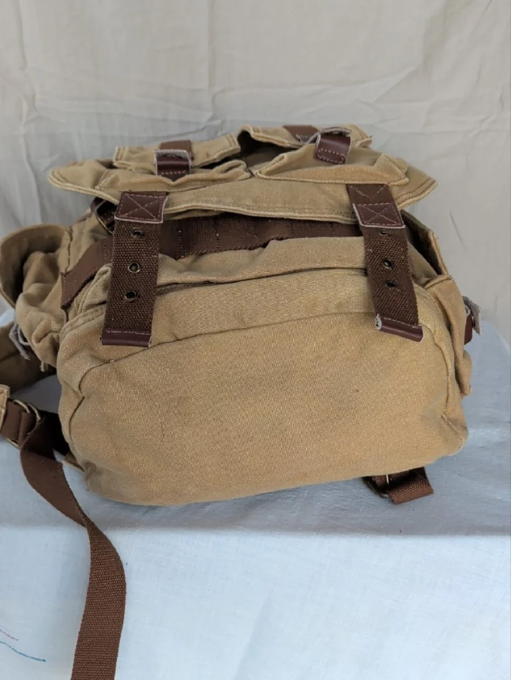 Durable Tan Canvas Backpack with Brown Trim Hiking Camping Outdoor Activities